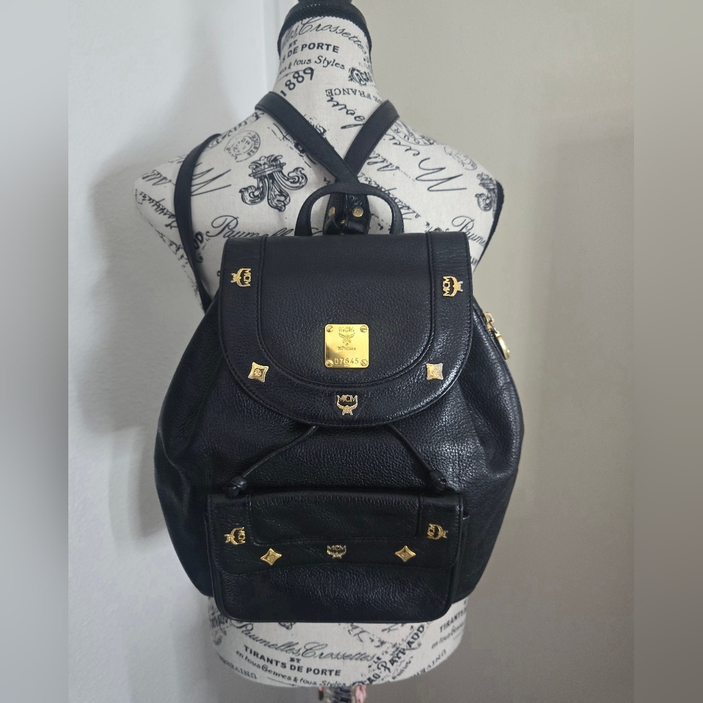 MCM Black Leather Logo Studded Backpack with Gold Hardware comes with COA